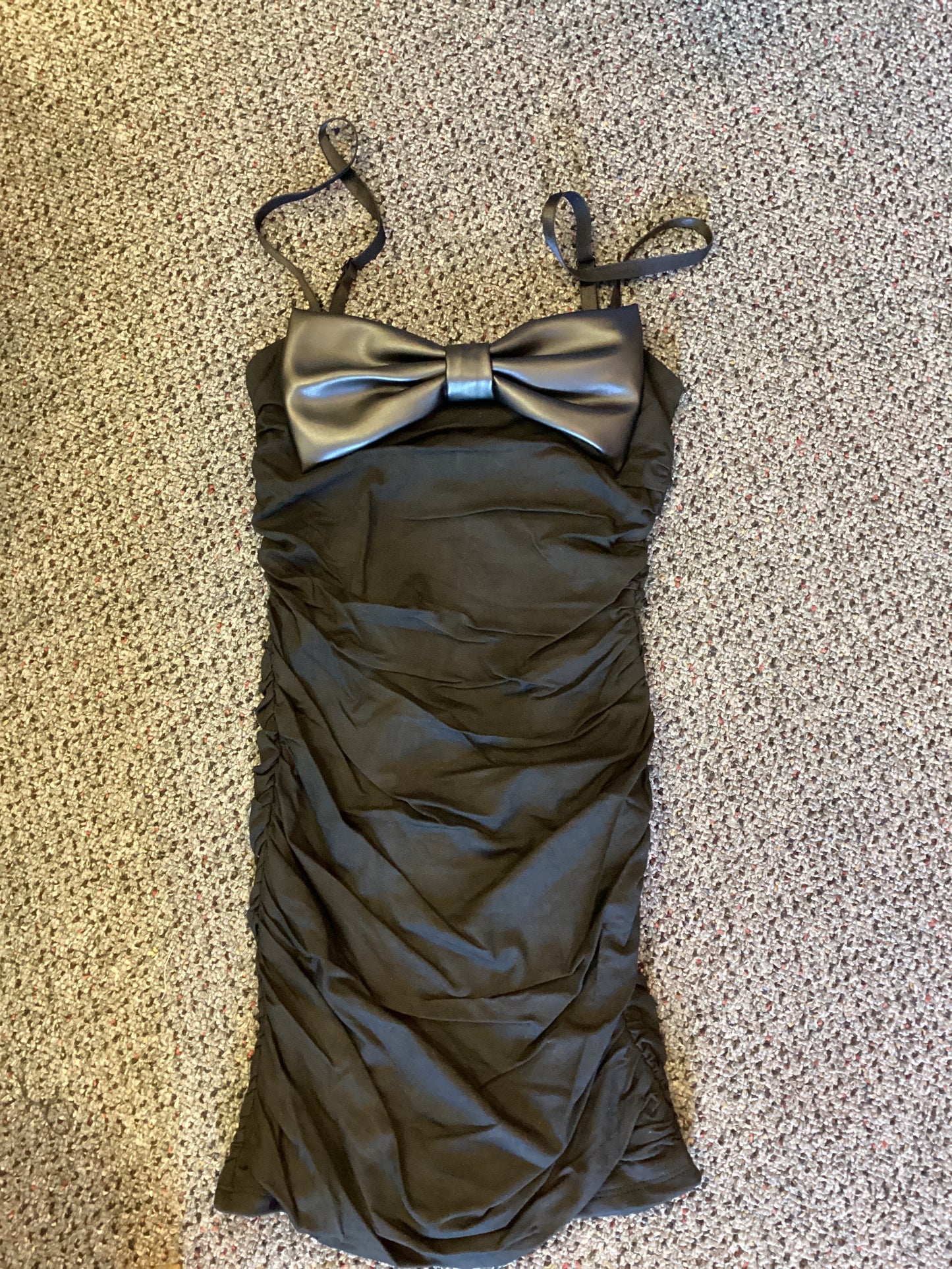 Gold Rush black dress with leather bow