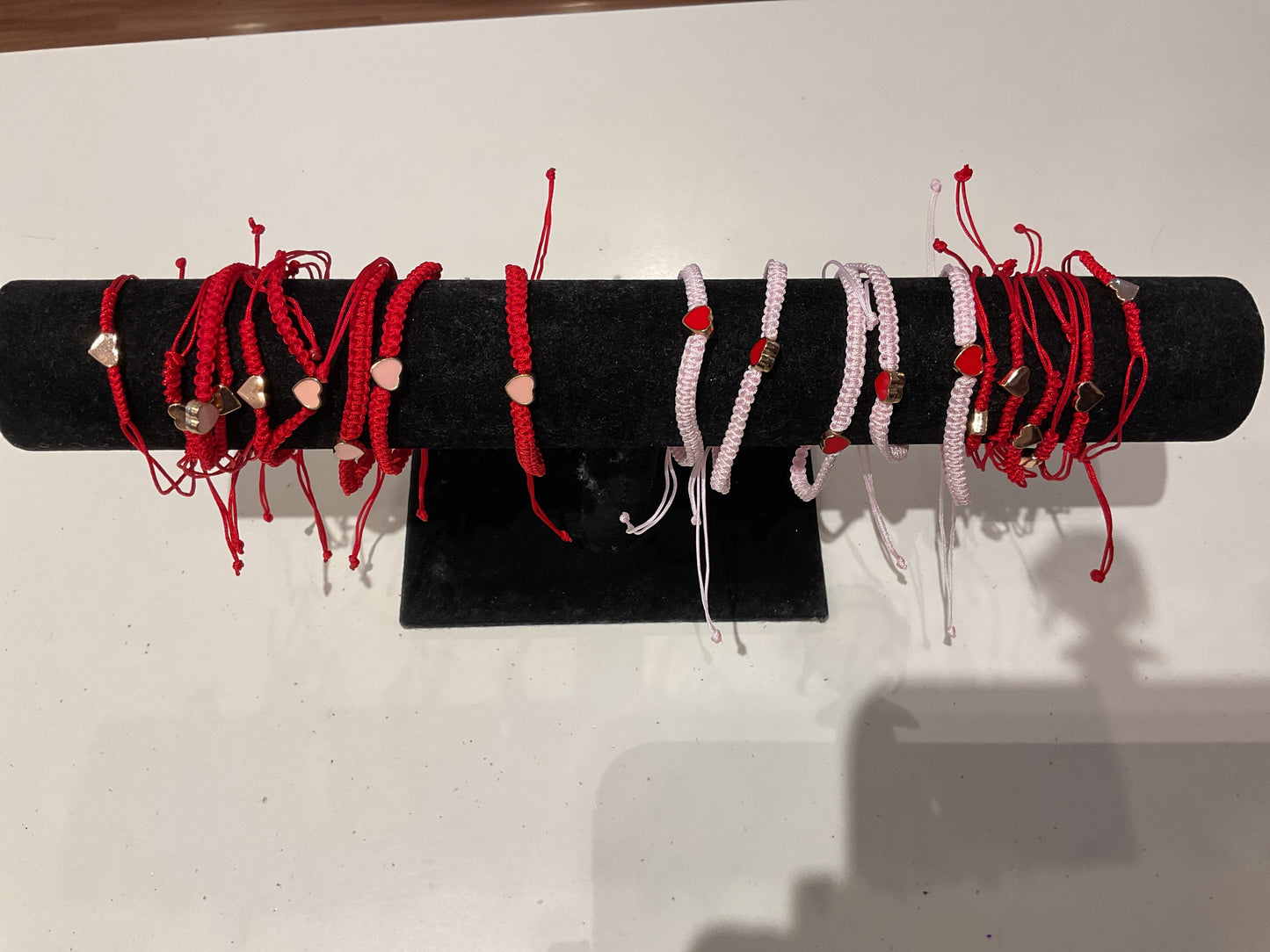 Pink and red heart string bracelets