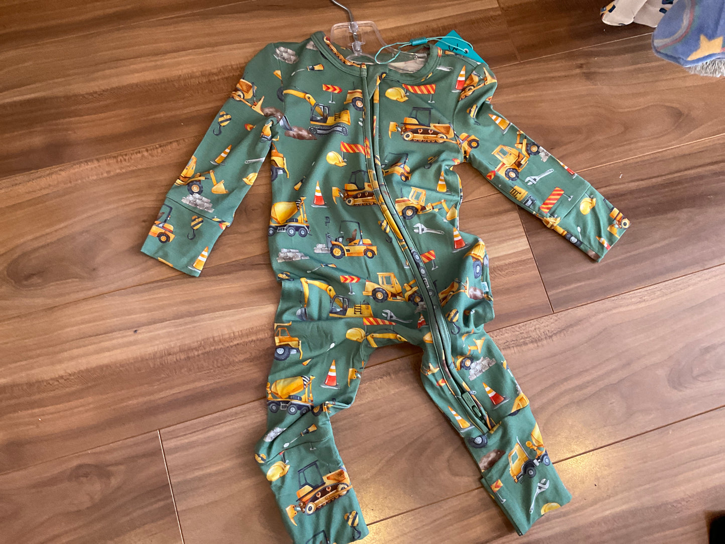 Posh peanut green construction onesie