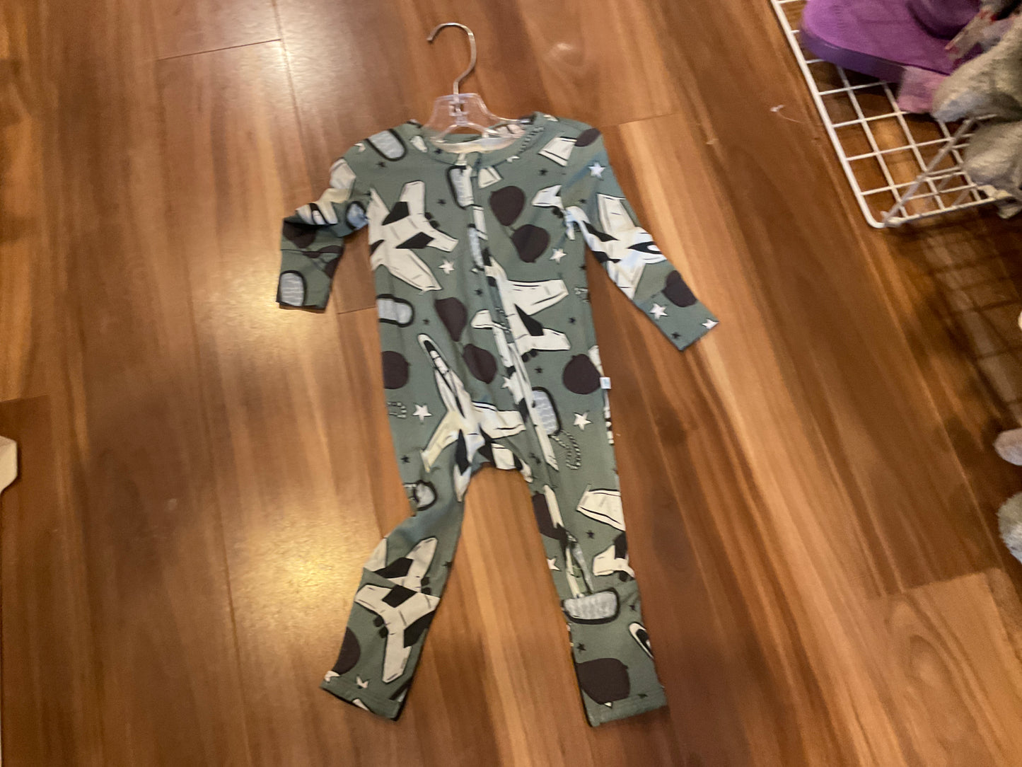 Posh peanut green aviation onesie