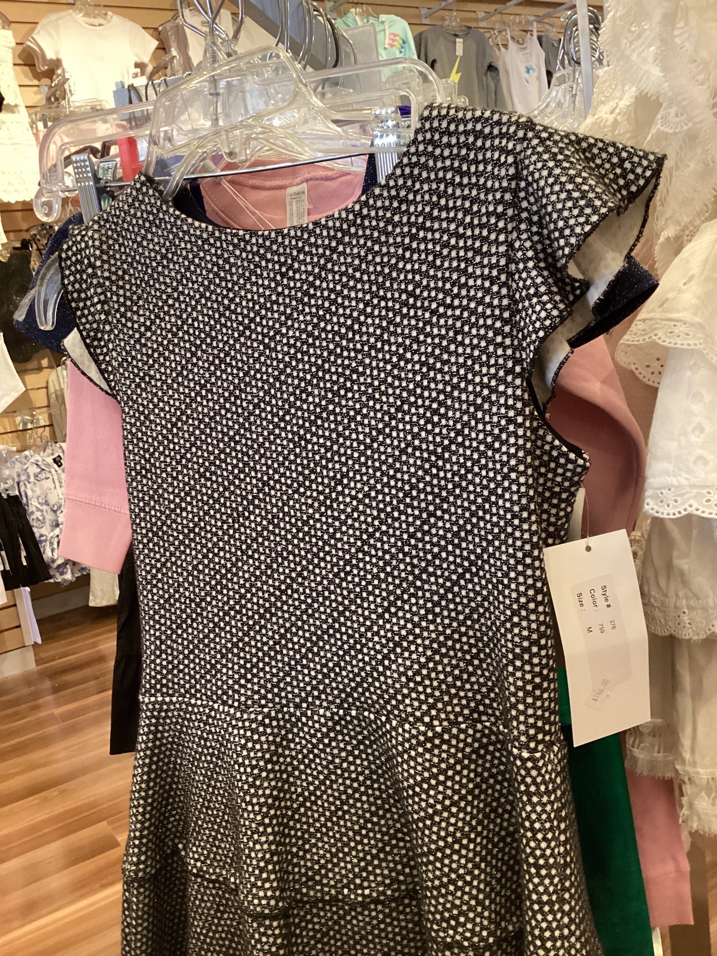 By Debra b/w ruffle dress