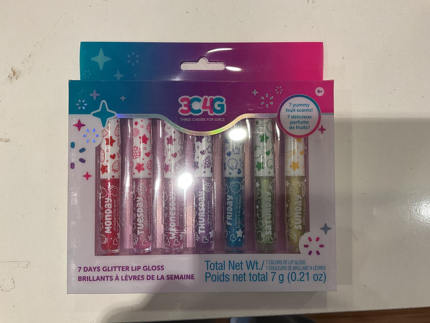 Seven day glitter lip gloss