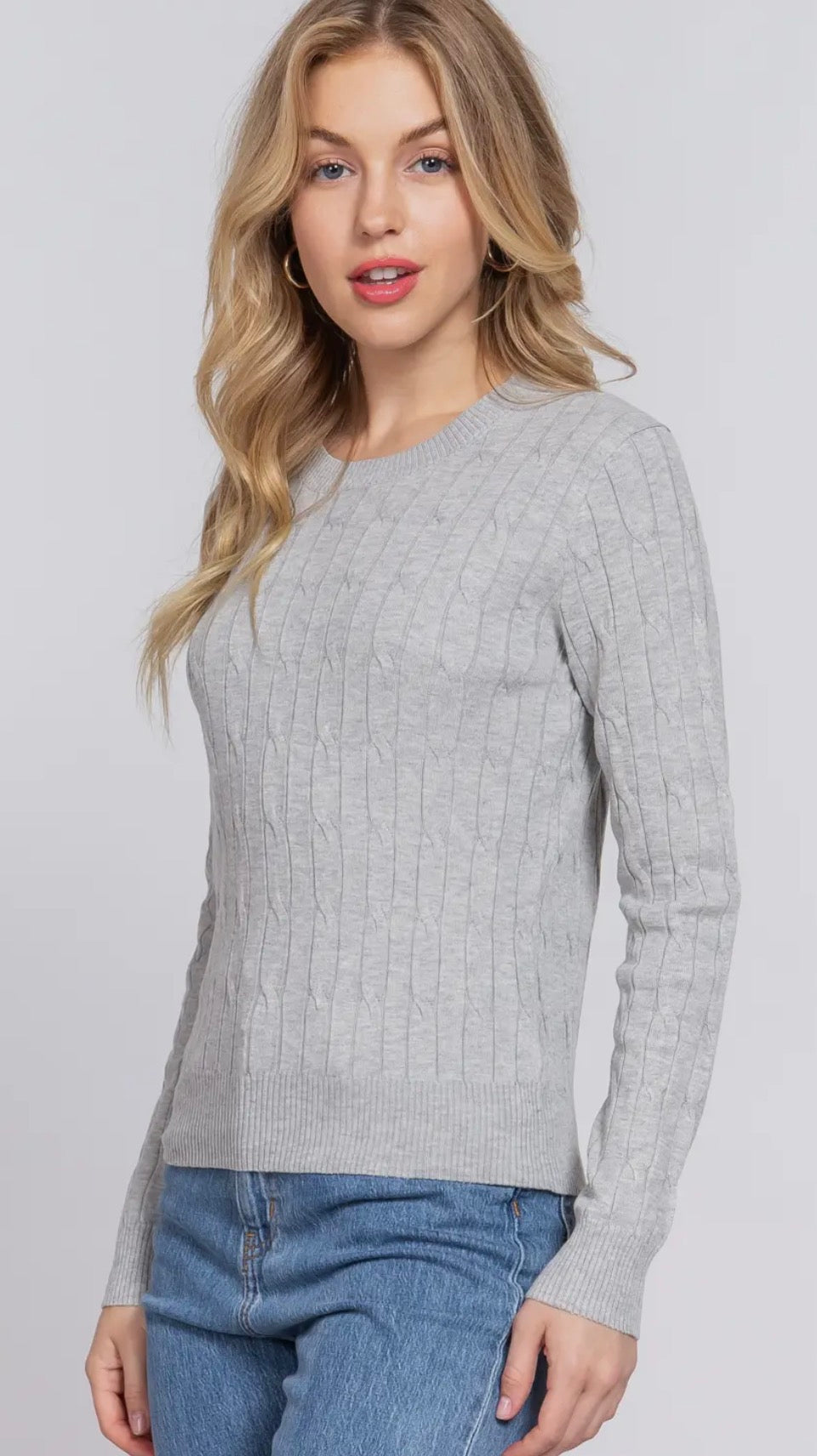 Grey round neck cable sweater