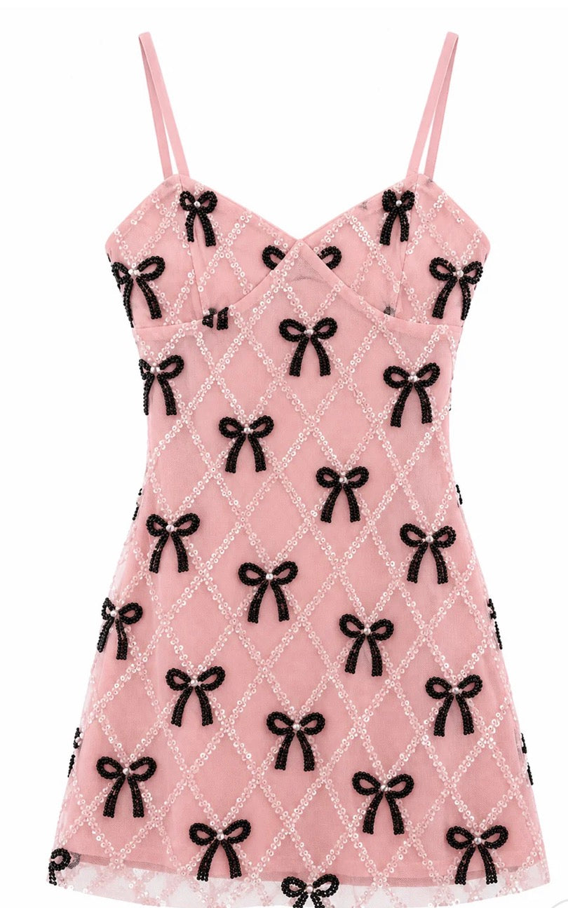 Pink dress with black bows
