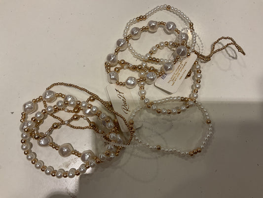 Pearl and gold set of three bracelets