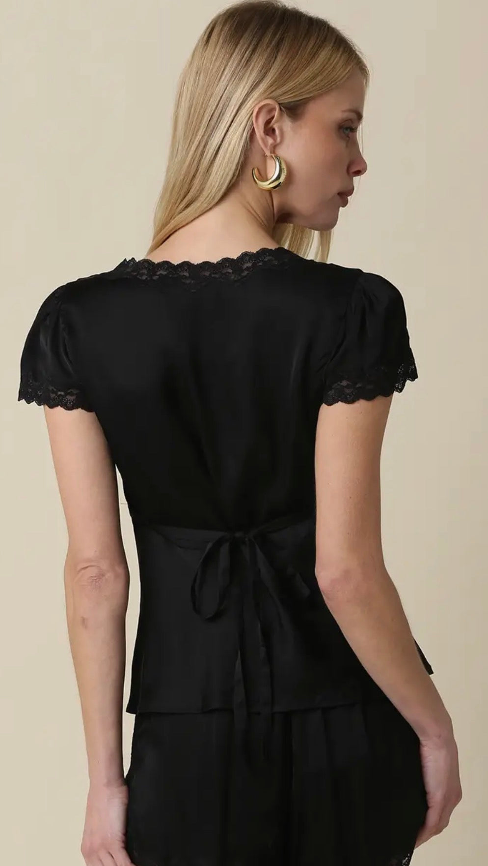 Black silk top with flower