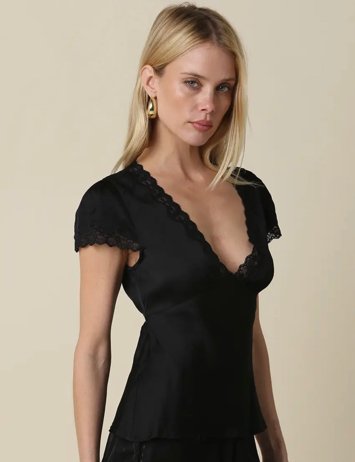 Black silk top with flower